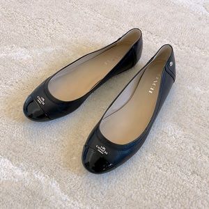 Coach Chelsea Matte black cap toe ballet flats.